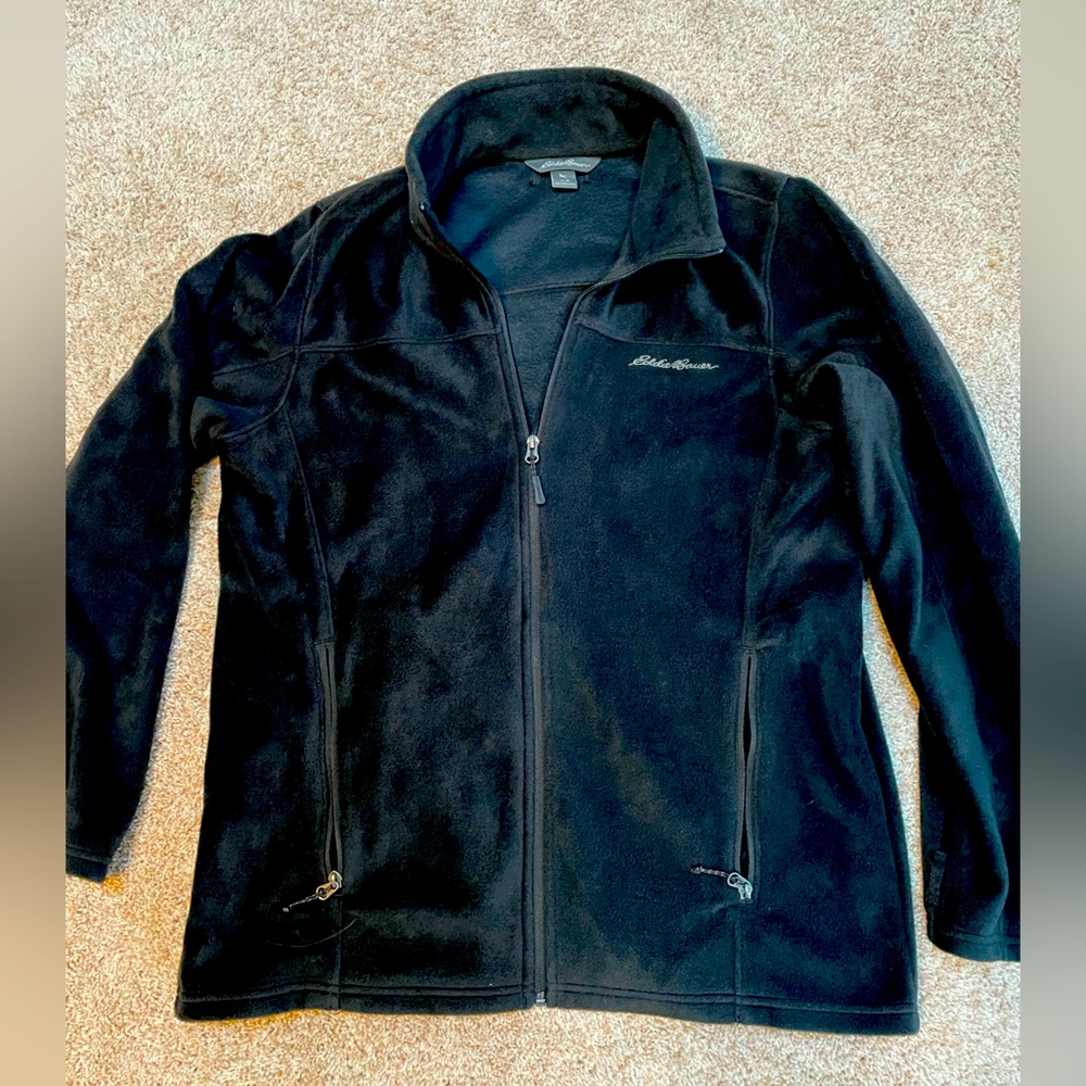 Black medium fleece jacket.